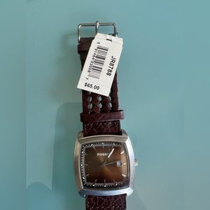 Fósil Watch. Brand new. Has small scratch on the back